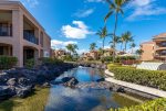 Landscaped grounds and waterway at the Bay Club at Waikoloa